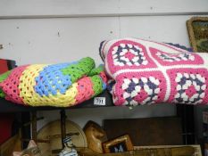 Two crocheted blankets.