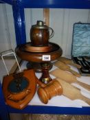 A mixed lot of wooden items including salad bowl, butter pats etc.,