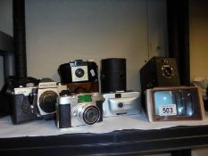 A mixed lot of vintage camera's including Kodak, Praktica etc.,