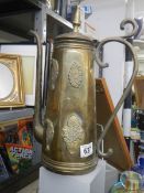 A large old brass pot.