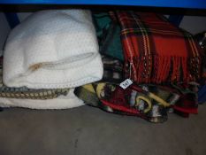 A quantity of blankets including picnic.