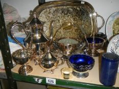 A mixed lot of silver plate including tray, teapot, bowls etc.,