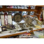 A mixed lot of silver plate including teapot, gravy boat, cutlery etc.,
