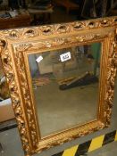A plastic framed mirror in a gold colour, COLLECT ONLY.
