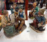 4 Capodimonte style figures of tramps/old men on park benches etc