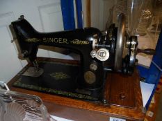 A Singer manual sewing machine, COLLECT ONLY.