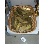 A quantity of brass hinges.