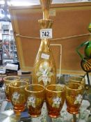 A hand decorated decanter and six glasses, COLLECT ONLY.