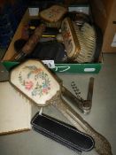 A mixed lot including hand mirrors, brushes etc.,