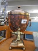 A Victorian copper and brass samovar urn.