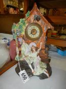 An early 20th century bisque porcelain clock in working order.