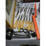 A quantity of cutlery including steak knives.