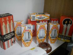 A quantity of boxed candles.