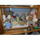 A shelf of assorted soft toys.