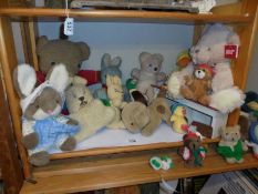 A shelf of assorted soft toys.