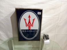 A Maseratti light box sign, 30 x 43 x 9 cm, COLLECT ONLY.