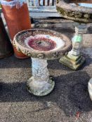 A weathered bird bath, 50cm high COLLECT ONLY.