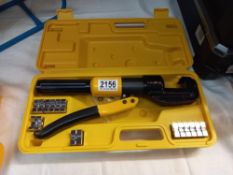 A hydraulic crimping tool in case COLLECT ONLY