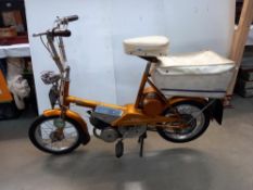 A 1968 Raleigh Wisp moped with VE60, 1971 tax disc & owners handbook etc. COLLECT ONLY