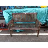 A good weathered outside garden bench, 129 x 90 cm. COLLECT ONLY.