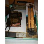 Three vintage tins of Carborundum valve grinding paste, pair of lappers and a valve lifting tool,