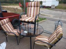 A glass topped metal outside table and four chairs, COLLECT ONLY.