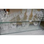 Two shelves of cut glass and other drinking glasses, COLLECT ONLY.