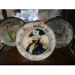 Three Royal Doulton collector's plates.