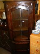 A good quality oak corner cabinet, COLLECT ONLY.