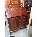 A mahogany bureau with serpentine front COLLECT ONLY