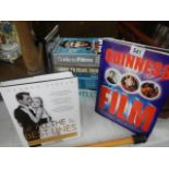 A quantity of 'Guide to Films' and other film related books.