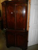 A four door mahogany corner cupboard, COLLECT ONLY.