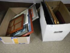 Two boxes of new picture frames.