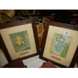 A pair of framed and glazed Nursery Rhyme prints.