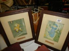 A pair of framed and glazed Nursery Rhyme prints.