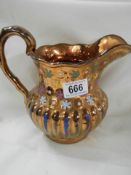 A 19th century copper lustre jug.