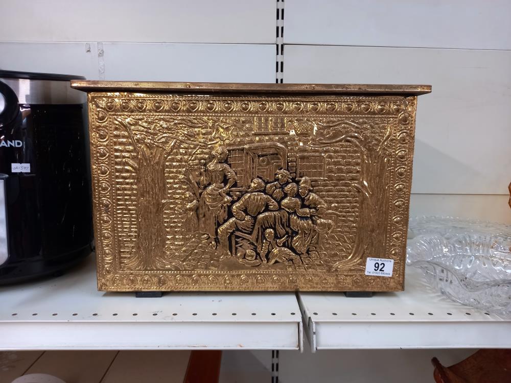 A vintage hammered brass log box COLLECT ONLY