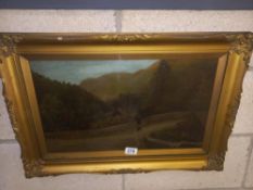 A 19th/20th century oil on canvas behind glass in gilt frame of a figure on a bridge in the
