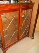 A good quality mahogany astragal glazed two door display cabinet, COLLECT ONLY.