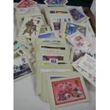 A large lot of Royal Mail postage stamp postcards.