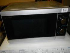 A Sharp microwave oven, COLLECT ONLY.