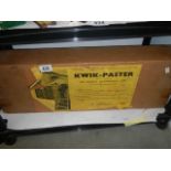 A boxed Kwik-Plaster decorator's tool.