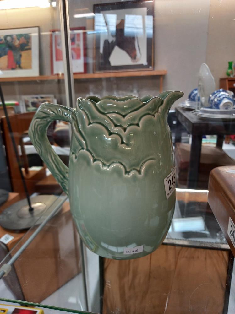 A green glazed Clarice Cliff jug - Image 2 of 3