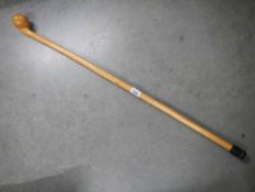 An unusual ash walking stick with knop handle.