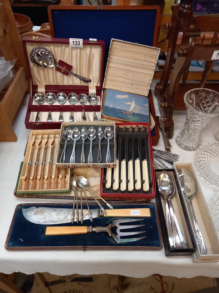 A quantity of cased cutlery etc