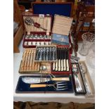 A quantity of cased cutlery etc