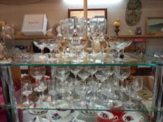 A good lot of drinking glasses on 2 shelves COLLECT ONLY