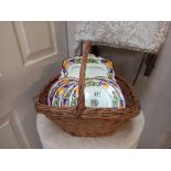A wicker basket and quantity of plates and a sandwich plate COLLECT ONLY
