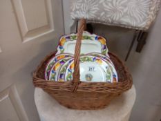 A wicker basket and quantity of plates and a sandwich plate COLLECT ONLY