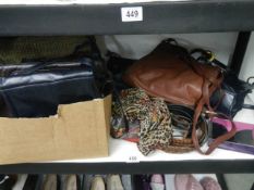 A mixed lot of handbags, belts etc.,